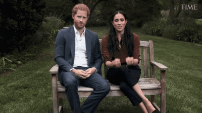 Prince Harry And Meghan Markle On Wooden Bench With TIME Logo GIF