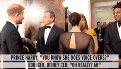 Prince Harry Is Talking To Bob Iger And Disney Ceo At An Event . GIF
