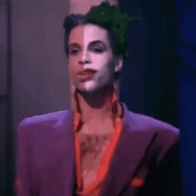 Prince In Purple Suit And Green Hat GIF