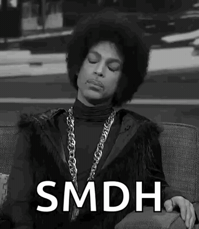 Prince Is Sitting On A Couch In A Black And White Photo With His Eyes Closed . GIF