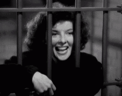 Prison Bars Happy Woman Waving Hand GIF