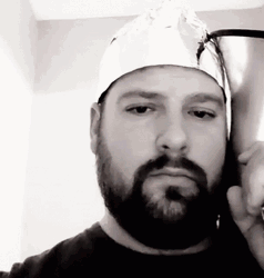 Profound Stare Man In Tinfoil Hat GIF