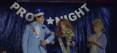 Prom Night Banner Behind Couple GIF