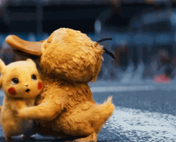 Psyduck Hugging Detective Pikachu GIF