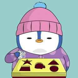 Pudgy Penguin Playing With Shape Puzzle GIF