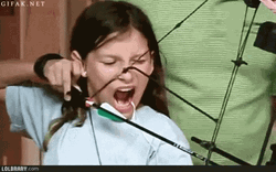 Pulling Teeth Using A Bow GIF