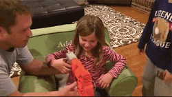 Pulling Teeth Using Toy Gun GIF