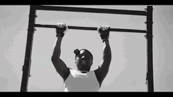 Pulling Up In A White Tank Top GIF