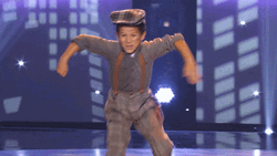 Pumped Up Dancing Kid Stage Performance GIF