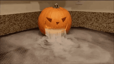 Pumpkin Face In Bathtub With Smoke GIF