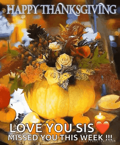 Pumpkin Filled With Flowers And Candles With Happy Thanksgiving Message GIF