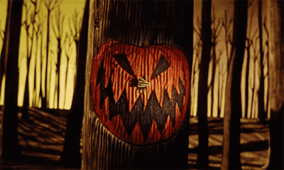Pumpkin Painting On Tree Trunk GIF