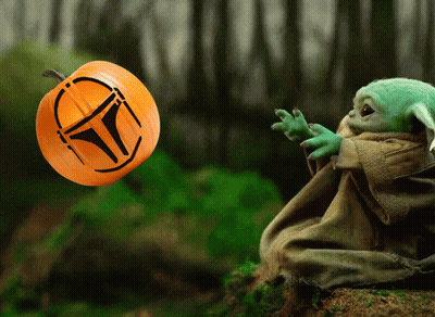 Pumpkin With Mandalorian Helmet Carved Into It GIF