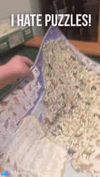 Punching Assembled Jigsaw Puzzle GIF