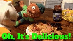 Puppet Eating Oh Its Delicious GIF