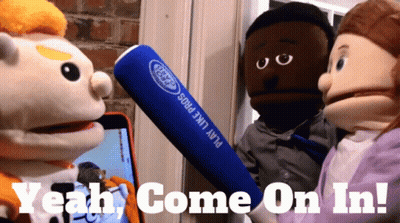 Puppet Holding Blue Bat Saying Yeah Come On In GIF