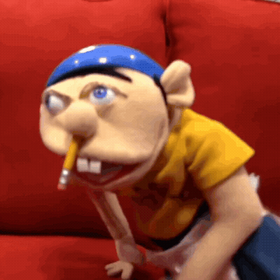 Puppet Holding Pencil In Mouth GIF