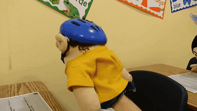 Puppet In Helmet At Desk GIF
