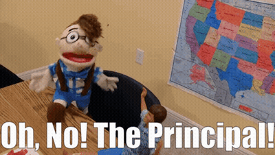 Puppet Sitting At Desk With Uh No Principal GIF