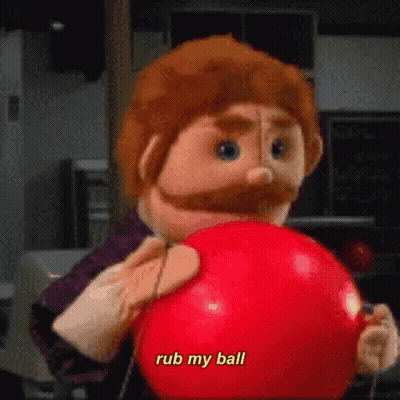 Puppet With Beard Holding Red Ball Says Rub My Ball GIF