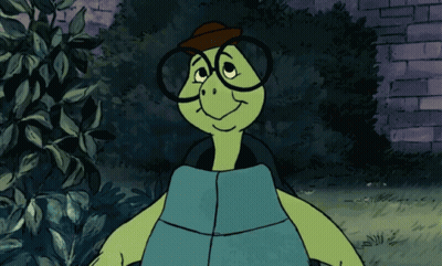 Puppet With Glasses And Bow Tie At Chalkboard GIF