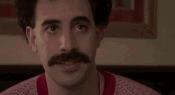 Puppy Dog Eyes Sacha Baron Cohen GIF