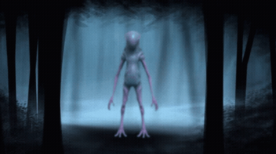 Purple Alien Standing In Dark Forest GIF