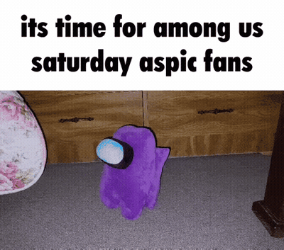 Purple Among Us Stuffed Animal Sitting On Floor GIF