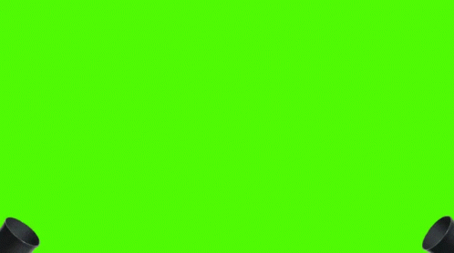 Purple And Black Confetti Is Falling From A Black Cannon On A Green Screen GIF