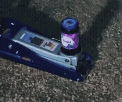 Purple Bottle Of Wipes On Blue Floor Jack GIF