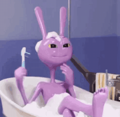 Purple Cartoon Character Bathing Holding Toothbrush GIF