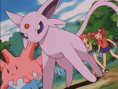 Purple Cat With Red Eye Surrounded By Girls GIF