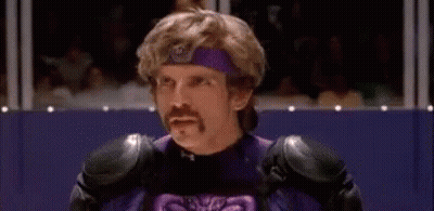 Purple Costumed Man With Mustache Before Crowd GIF