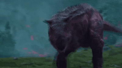 Purple Dinosaur With Mouth Open In Grass GIF
