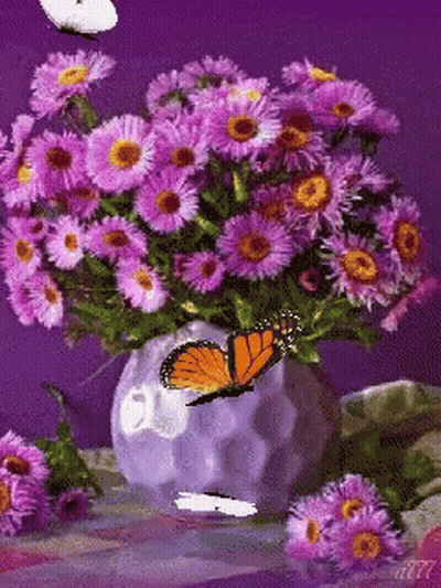 Purple Flowers In A Vase With A Butterfly GIF