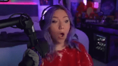 Purple-Haired Woman Saying Okay At Microphone With Headphones GIF