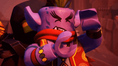 Purple Lego Character With Scarf Making Funny Face GIF