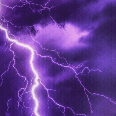 Purple Lightning Strikes In Night Sky GIF