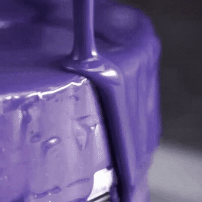 Purple Paint Poured On Metal GIF