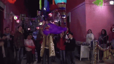 Purple Piñata Thrown By Group GIF