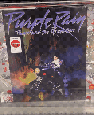 Purple Rain Prince And The Revolution Album Cover With A Motorcycle On It GIF