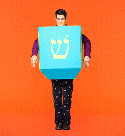 Purple Shirt Man Holding Blue Box Hebrew Symbol GIF