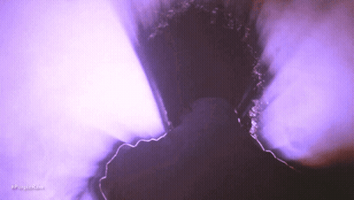 Purple Smoke Is Coming Out Of A Hole In A Wall GIF