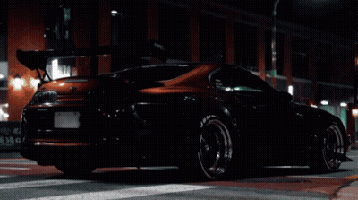 Purple Sports Car Parked At Night GIF