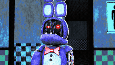 Purple Stuffed Animal With Red Eyes Standing In Room GIF