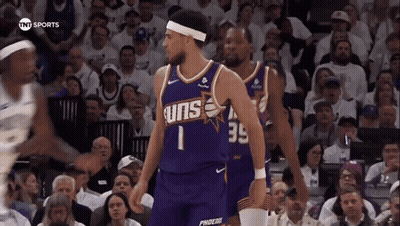Purple Suns Basketball Player With Crowd GIF