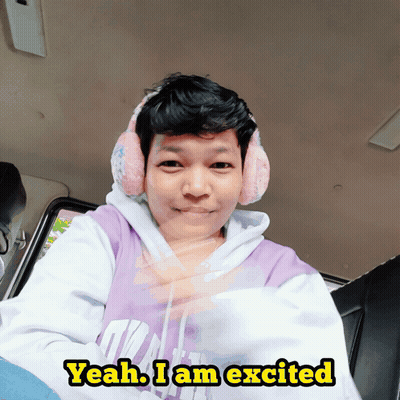 Purple Sweatshirt Ear Warmers Person Saying Yeah I Am Excited GIF