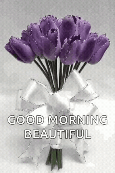 Purple Tulips Bouquet In White Vase GIF