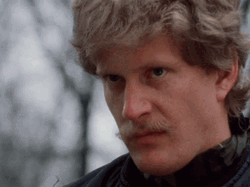 Pushing Out A Knife In Killer Looks GIF