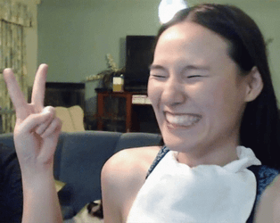 Putting On Whipped Cream On Woman's Face GIF